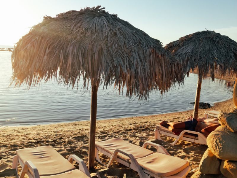 albanian tourism boom. a photo picturing sunbeds in albania riviera